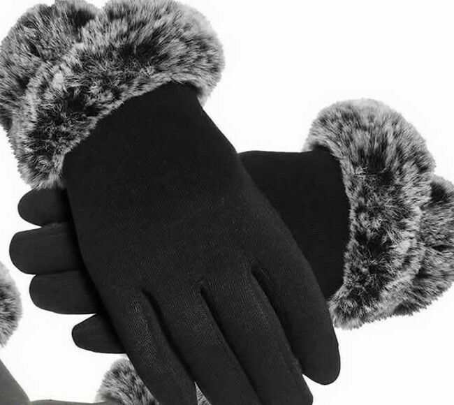 Heated gloves for women with fur cuff and touchscreen capability in black.