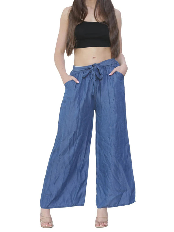 Women denim wide leg palazzo trousers with elastic waist and pockets.