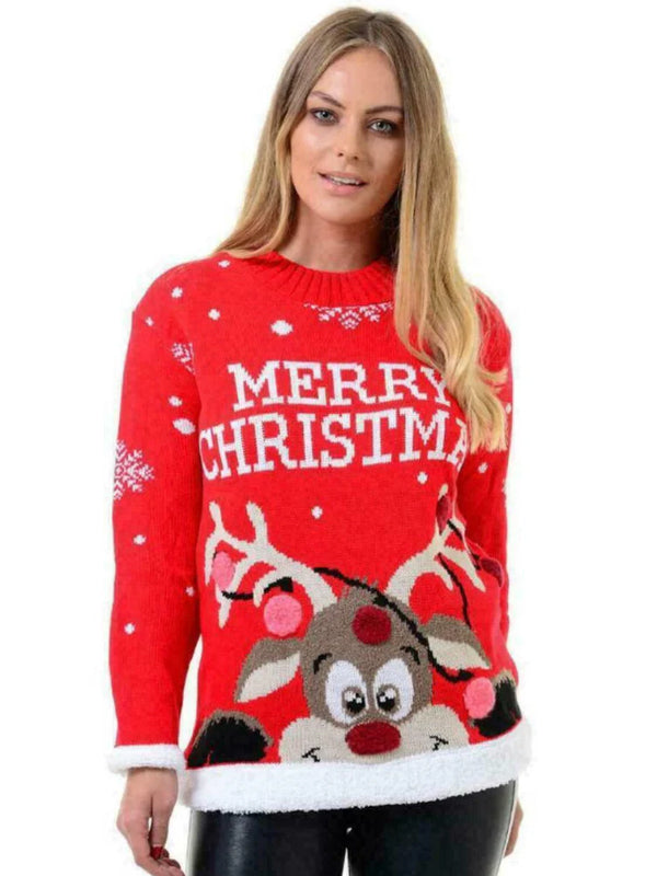 Women's red Christmas novelty jumper featuring Rudolph design and "Merry Christmas" text, multicolored 3D pom-pom accents, long sleeve crew neck style.