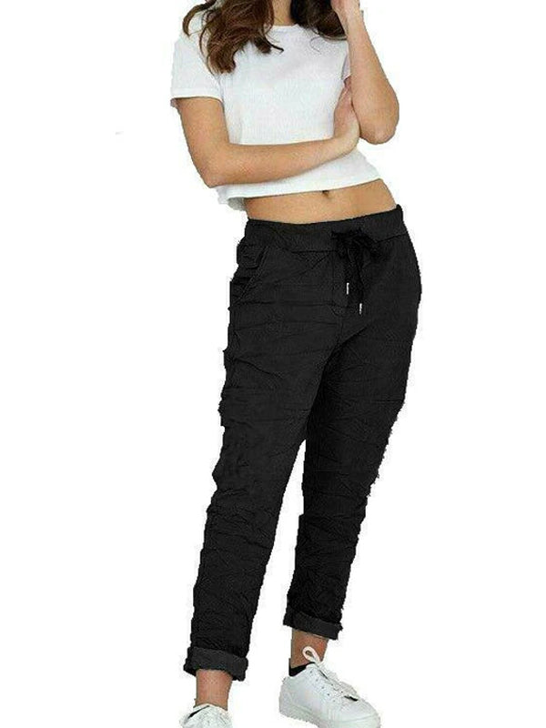 Women's black palazzo pants with stretch fit, comfortable and temperature regulating.